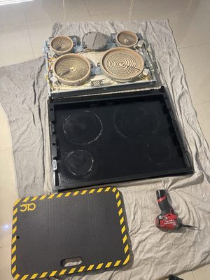 Range components laid out during a service visit in Leo’s portfolio.